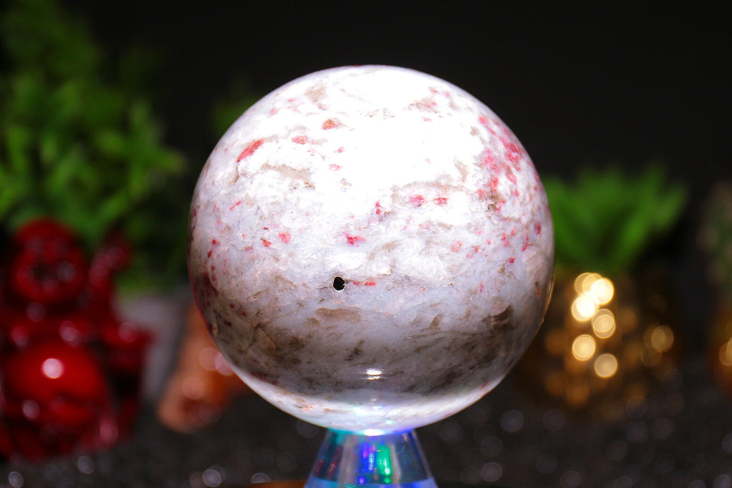 Rubellite (red tourmaline) in quartz Sphere